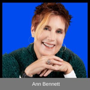 Headshot of Ann Bennett with hands crossed